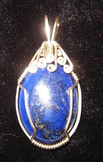 P-30 Lapiz cabochon wrapped in 14 carat gold-filled wire $35.jpg
